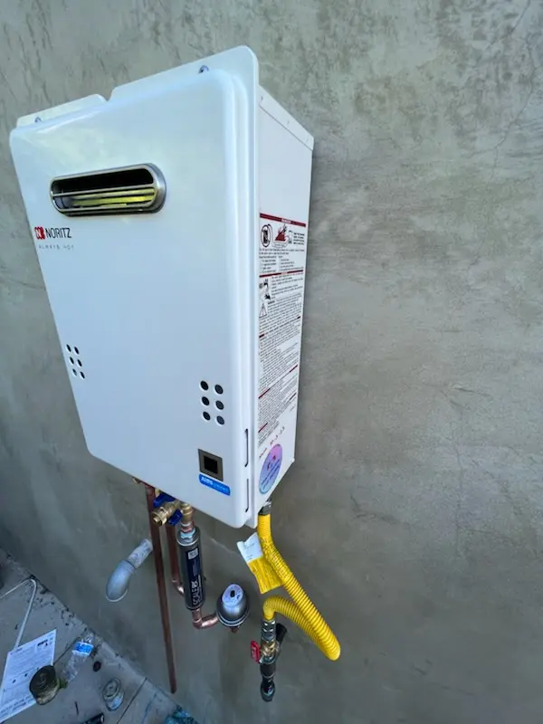 Tankless water heater installation for Northern Woods homes